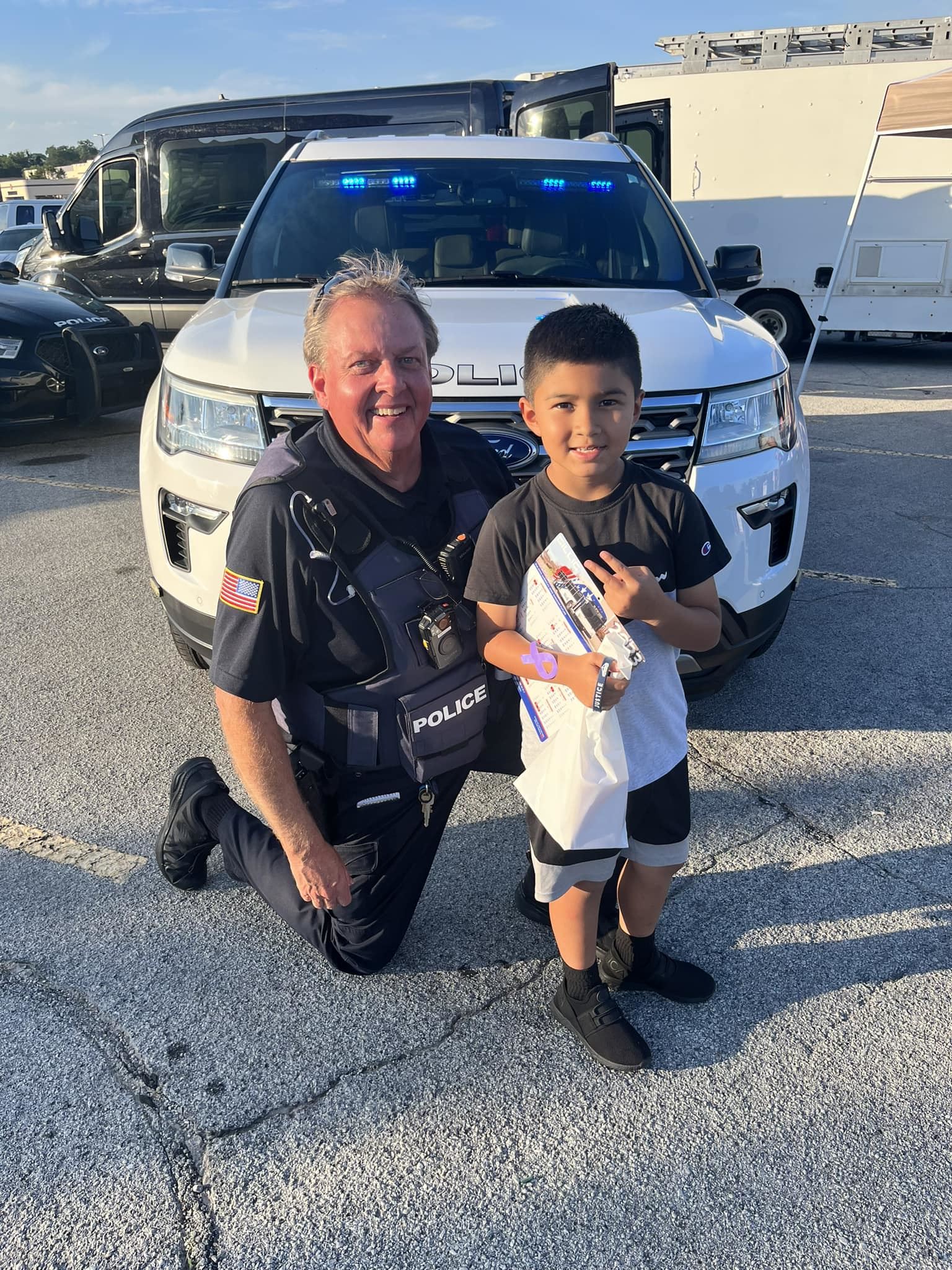 officer with small child